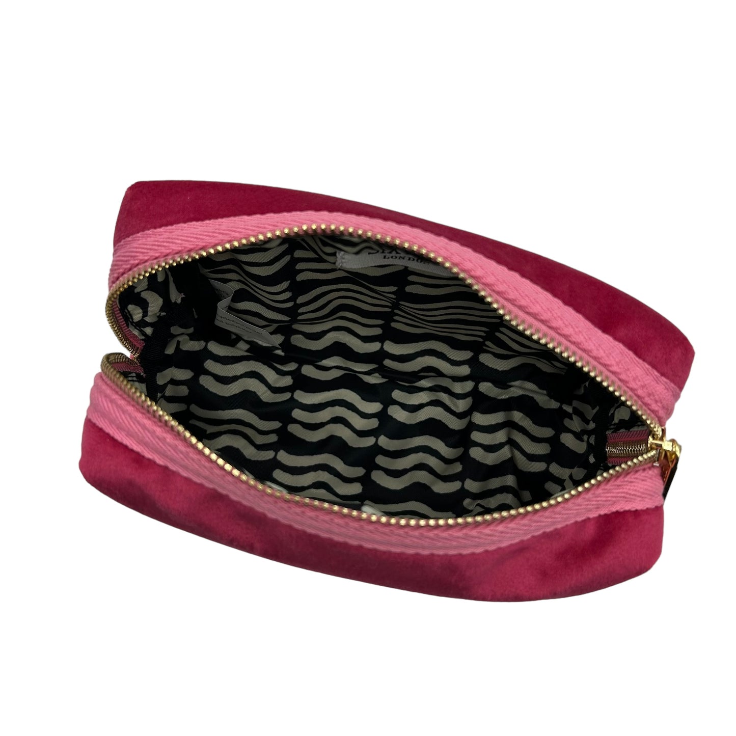 Bright pink makeup bag with Jewelled Insect brooch