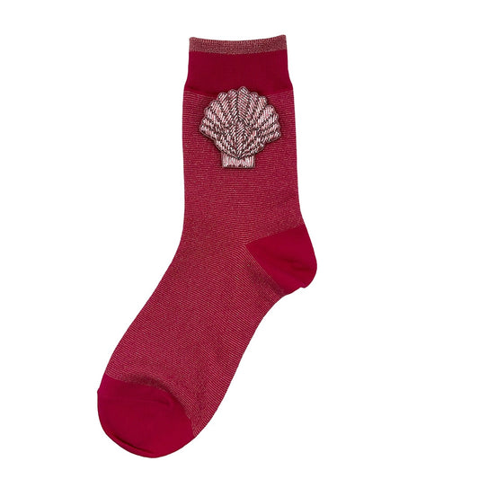 Tokyo socks in bright pink with a pink shell brooch