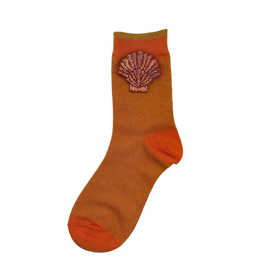 Tokyo socks in mint cantaloupe a coral shell brooch