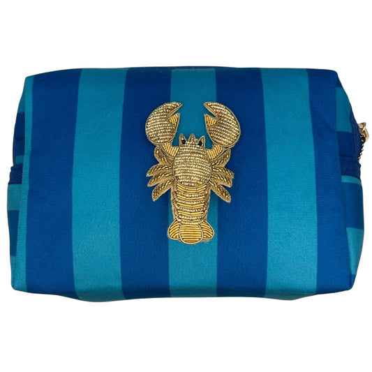 Blue stripe makeup bag with detachable brooch