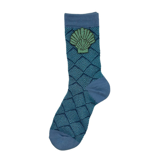 Paris socks in blue with a mint shell brooch