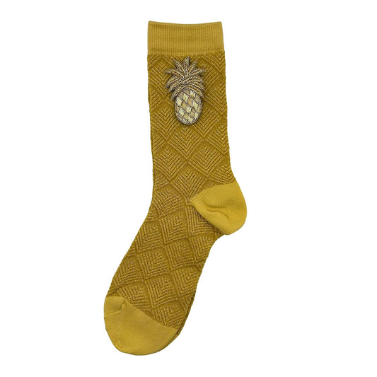 Paris socks in lemon with a pineapple brooch